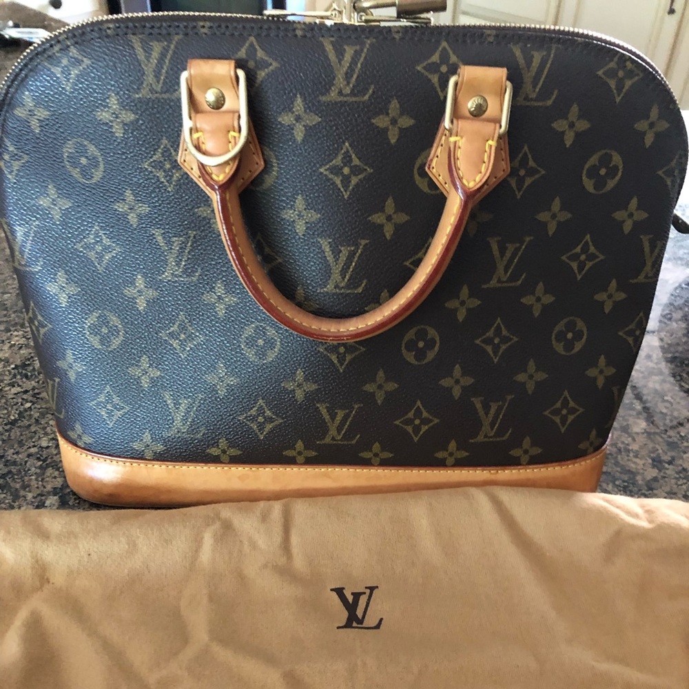 Vintage Louis Vuitton Alma handbag.